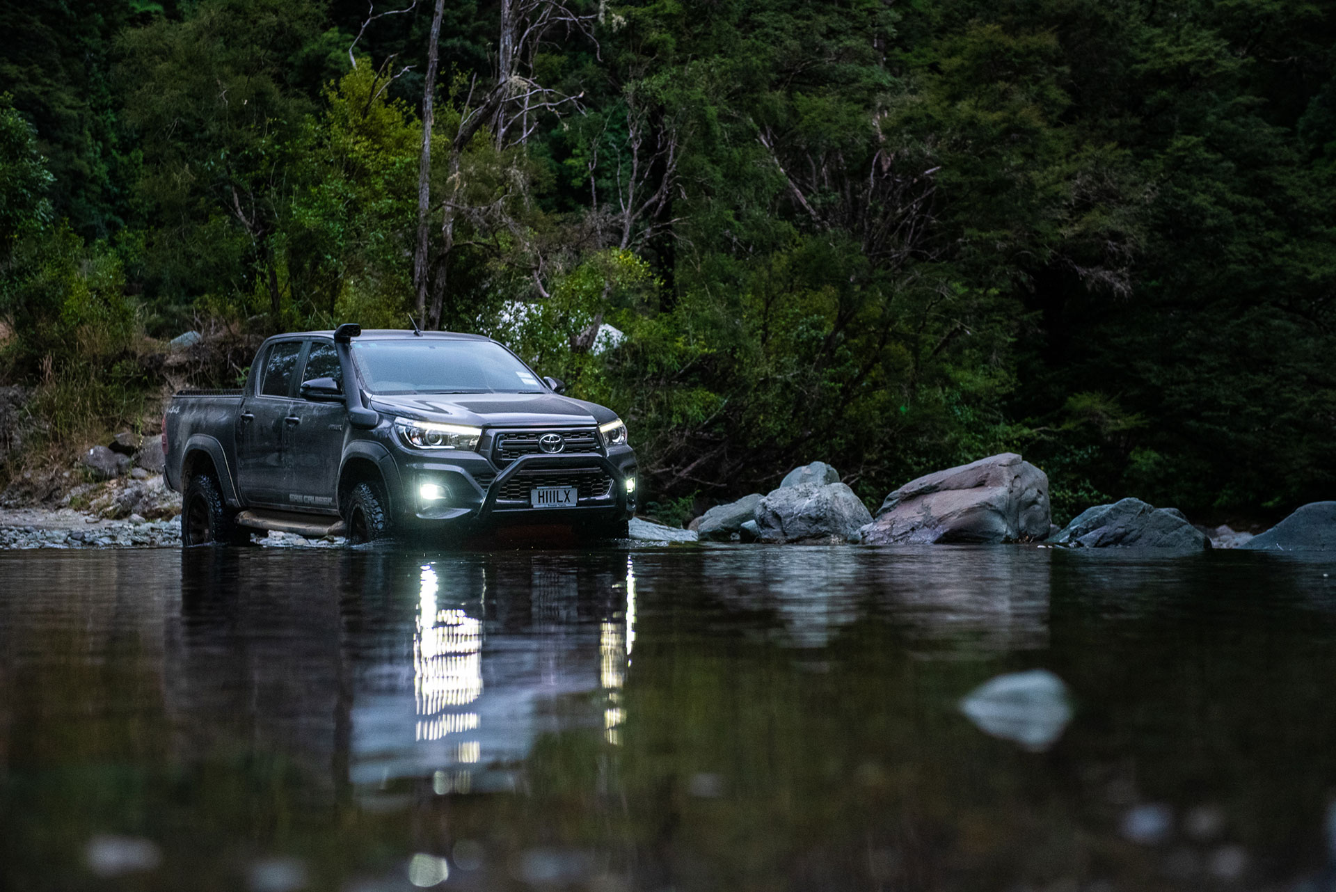 Toyota Hilux wading through river at The Gorge