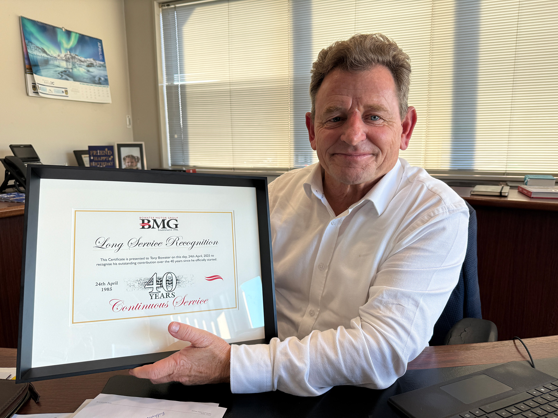 Tony Bowater with his 40 years long service certificate